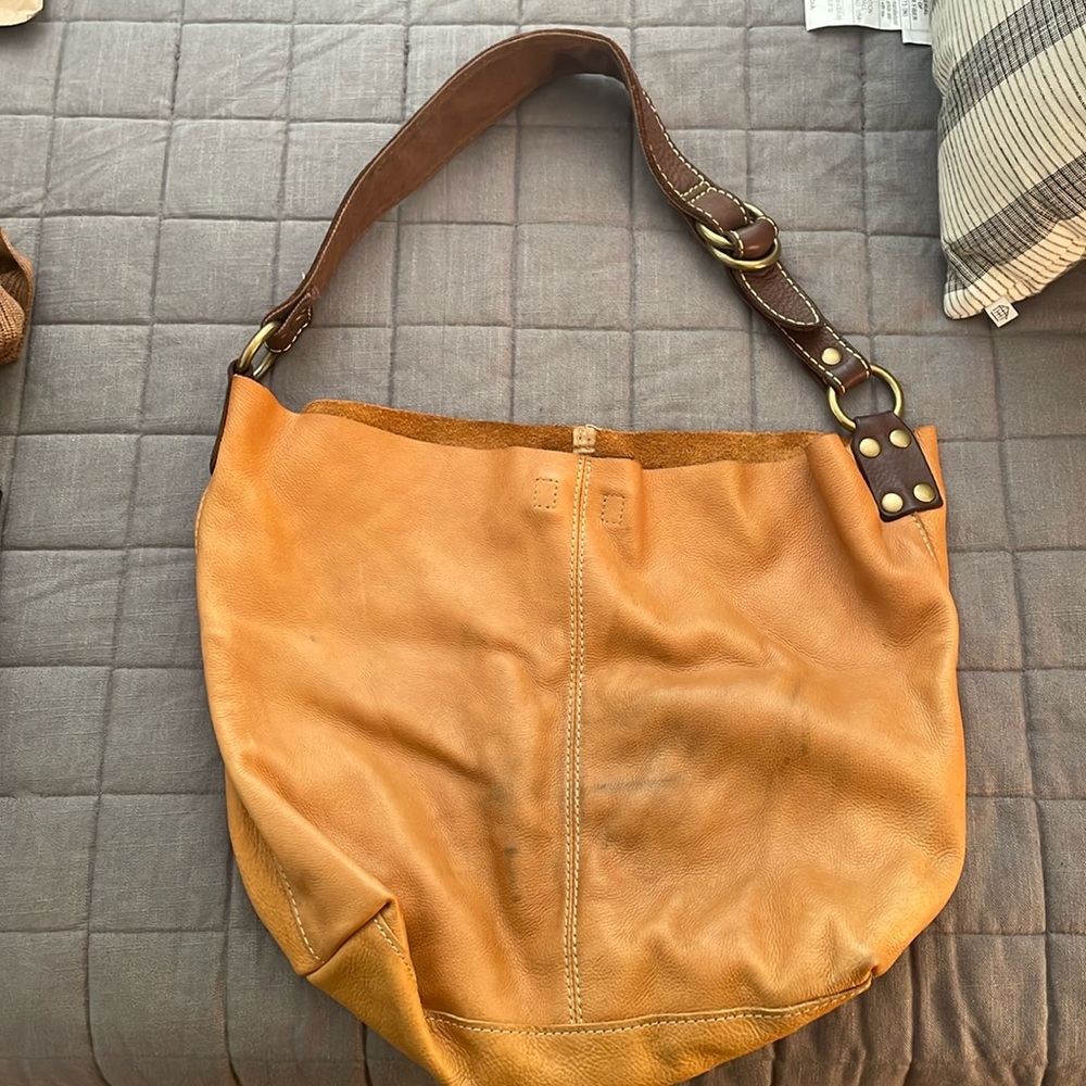 Brown leather bag, camel color, raw leather inside